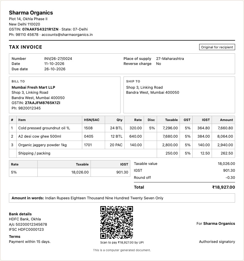 Sample GST tax invoice made with the free billing software, showing IGST, HSN codes, amount in words and a UPI QR code